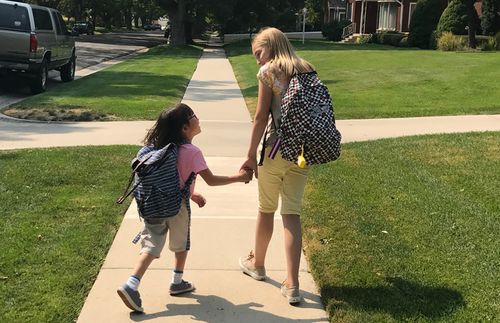 Sarah and her sister walking