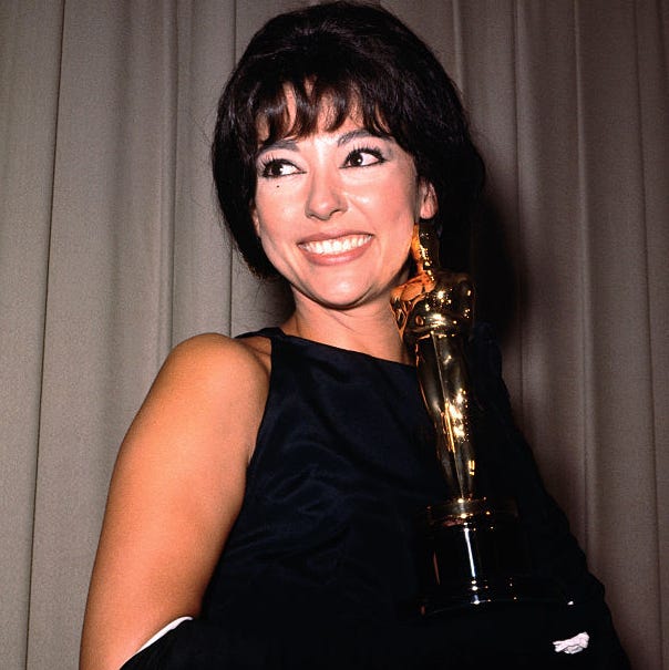 rita moreno holding award