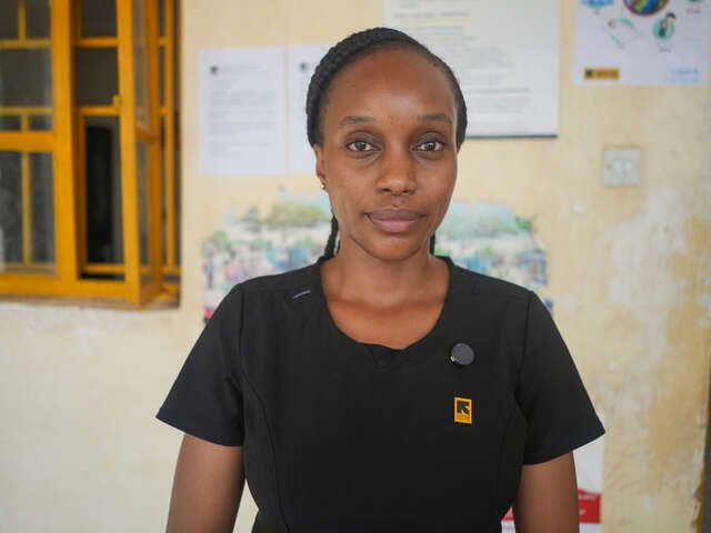 IRC Health Manager Dr. Sila Mothe poses in front of IRC-run Amusait Hospital.